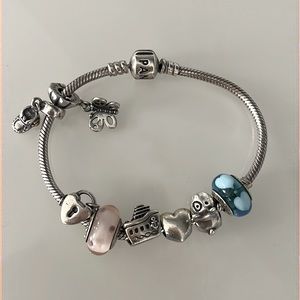 Original pandora bracelet with 8 charms.